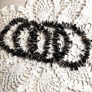 Four Black Shell Bracelet Set